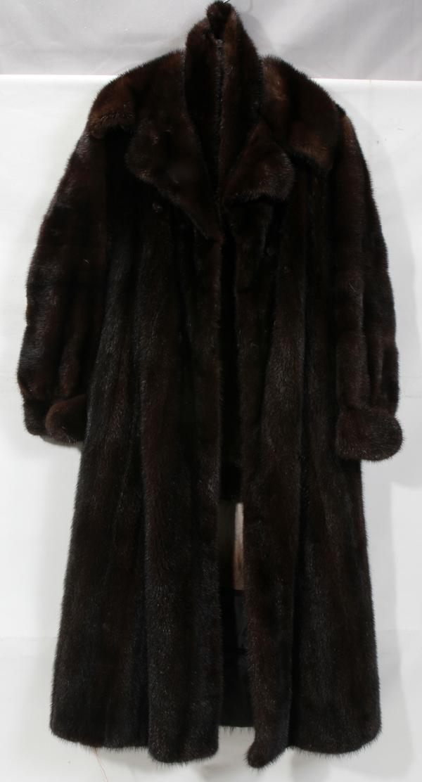 BONWIT TELLER FULL LENGTH MINK COAT: BONWIT TELLER FULL LENGTH MINK COAT:Brown mink. Clips to close with belt. Size 8-10 ?