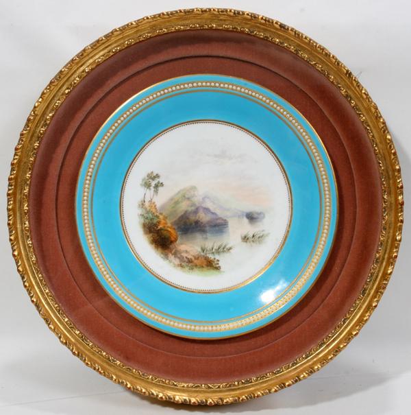 ENGLISH ANTIQUE PLATE IN SHADOWBOX FRAME: ENGLISH ANTIQUE HAND PAINTED PLATE IN SHADOWBOX FRAME, DIA 9":Landscape scene hand painted and antique having blue border with raised enamel dots. Probably Minton. Well executed scene. Frame size 13".