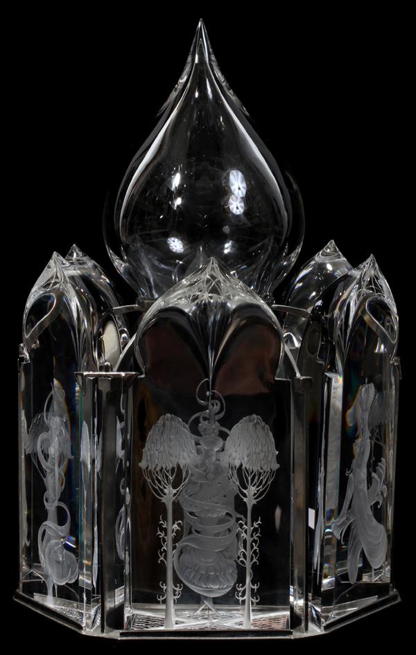 STEUBEN GLASS 'THE THOUSAND AND ONE NIGHTS', : STEUBEN GLASS 'THE THOUSAND AND ONE NIGHTS', SIGNED, H 11", W 7", D 6 1/2":Crystal palace engraved with figures from the Arabian Nights' Entertainments. The Isfahan dome is surrounded by six arched pr
