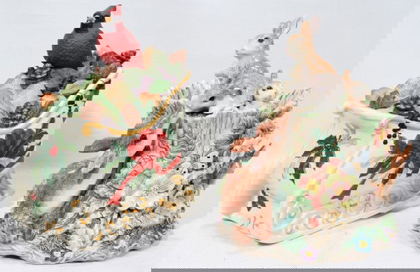 LENOX, FITZ, FLOYD PORCELAIN HOLIDAY COOKIE JAR: LENOX & FITZ & FLOYD PORCELAIN HOLIDAY THEMED COOKIE JARS, TWO, H 10 1/2":Including 1 Lenox "Winter Greetings" cookie jar consisting of a cardinal perched atop a sleigh full of fruit, trademark on the