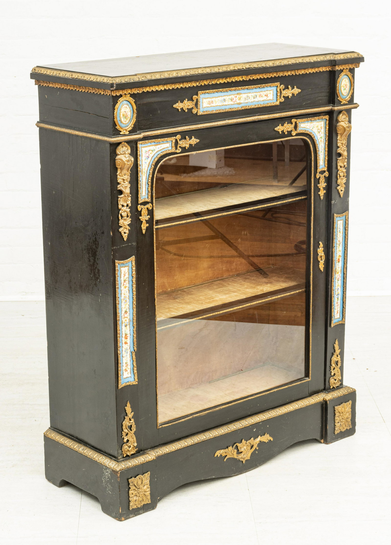 FRENCH NAPOLEON III EBONIZED WOOD CABINET, PORCELAIN &: FRENCH NAPOLEON III EBONIZED WOOD CABINET, PORCELAIN & ORMOLU, 19TH C, H 45.5", W 35" A 19th century French Napoleon III ebonized wood cabinet. Offers hand-painted porcelain plaques with floral studie