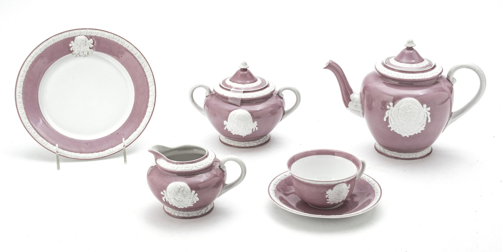 CZECHOSLOVAKIAN LUNCHEON SET, WITH BISQUE MEDALLIONS: CZECHOSLOVAKIAN LUNCHEON SET, WITH BISQUE MEDALLIONS C. 1900, 21 PCS Teapot, sugar, creamer, 6 plates @ 8", 6 cups, 6 saucers. Pink band, bisque medallion. Stamped "Musterschute" or "Registered Design