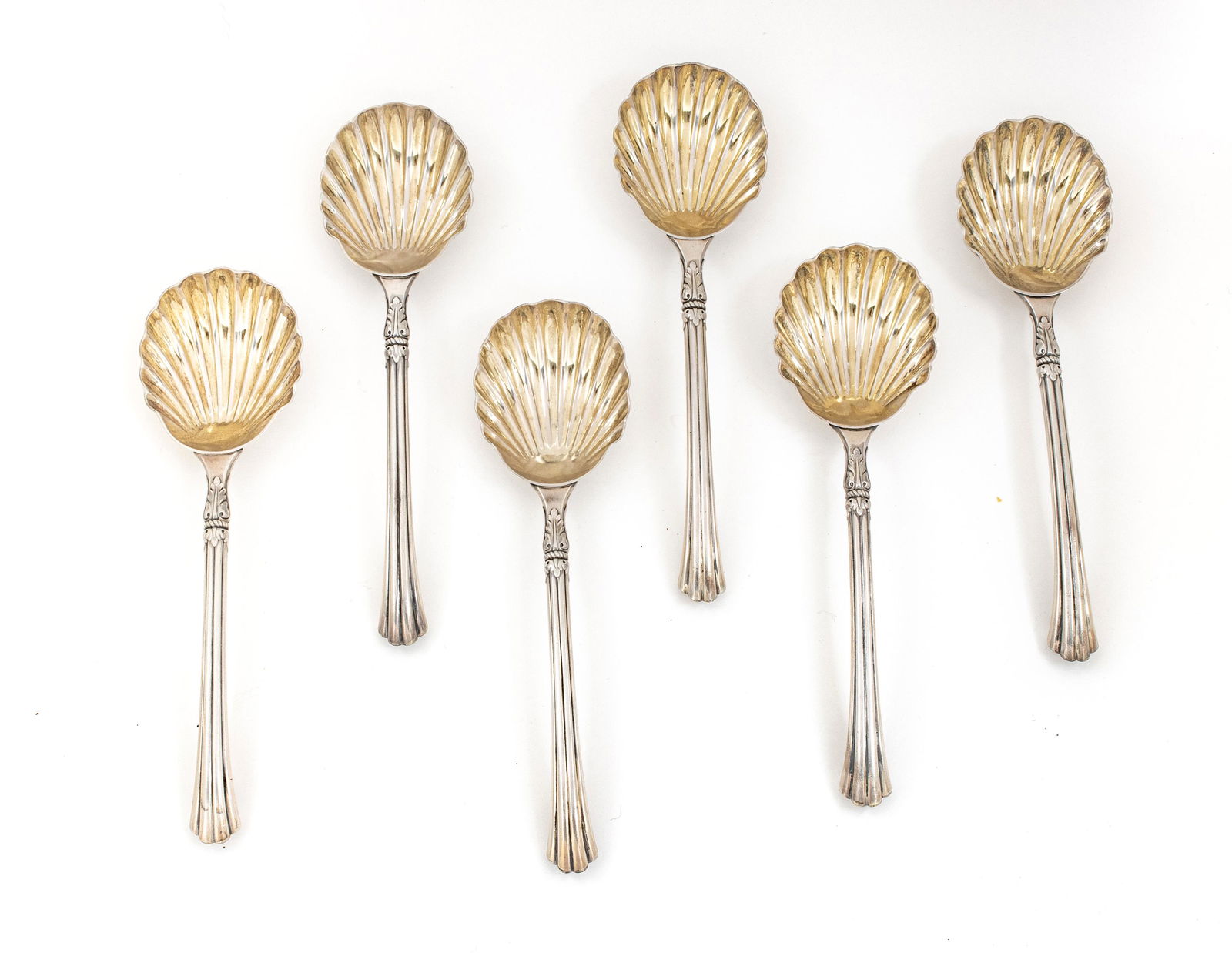 FREDERICK ELKINGTON (ENGLISH) STERLING SILVER SPOONS, 6: FREDERICK ELKINGTON (ENGLISH) STERLING SILVER SPOONS, 6 PCS, L 8", T.W. 10.03 TOZ A set of six Frederick Elkington sterling silver spoons. Retailed by Carrington Co. Regent Street. Shell form bowls. A