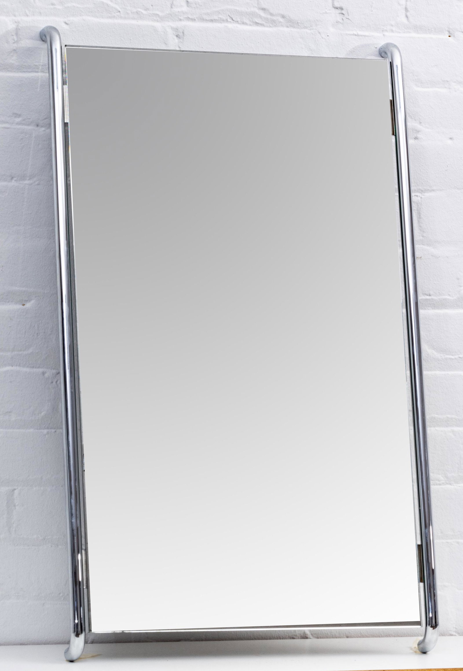 CHROMED STEEL MIRRORS, PAIR, H 33", W 20": CHROMED STEEL MIRRORS, PAIR, H 33", W 20" A pair of chromed steel bathroom mirrors. Offers a tubular, minimalist design. Attractive pair.