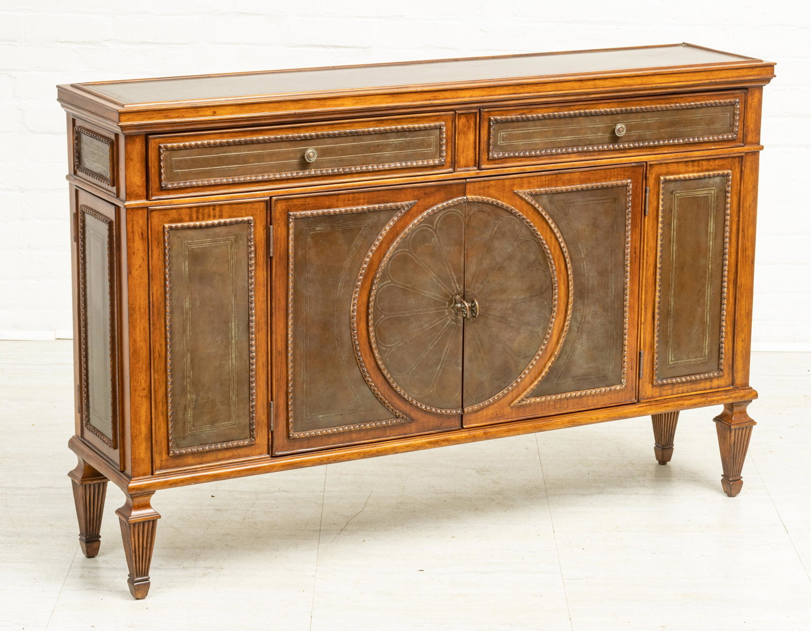 MAHOGANY AND BRASS/TIN CABINET WITH SECRET CABINETS H: MAHOGANY AND BRASS/TIN CABINET WITH SECRET CABINETS H 35" W 54.5" D 12.25" Regency style. Inset metal on upper surface as well as drawer and door front panels. Modern. Estate of Joan Young, Kalamazoo,