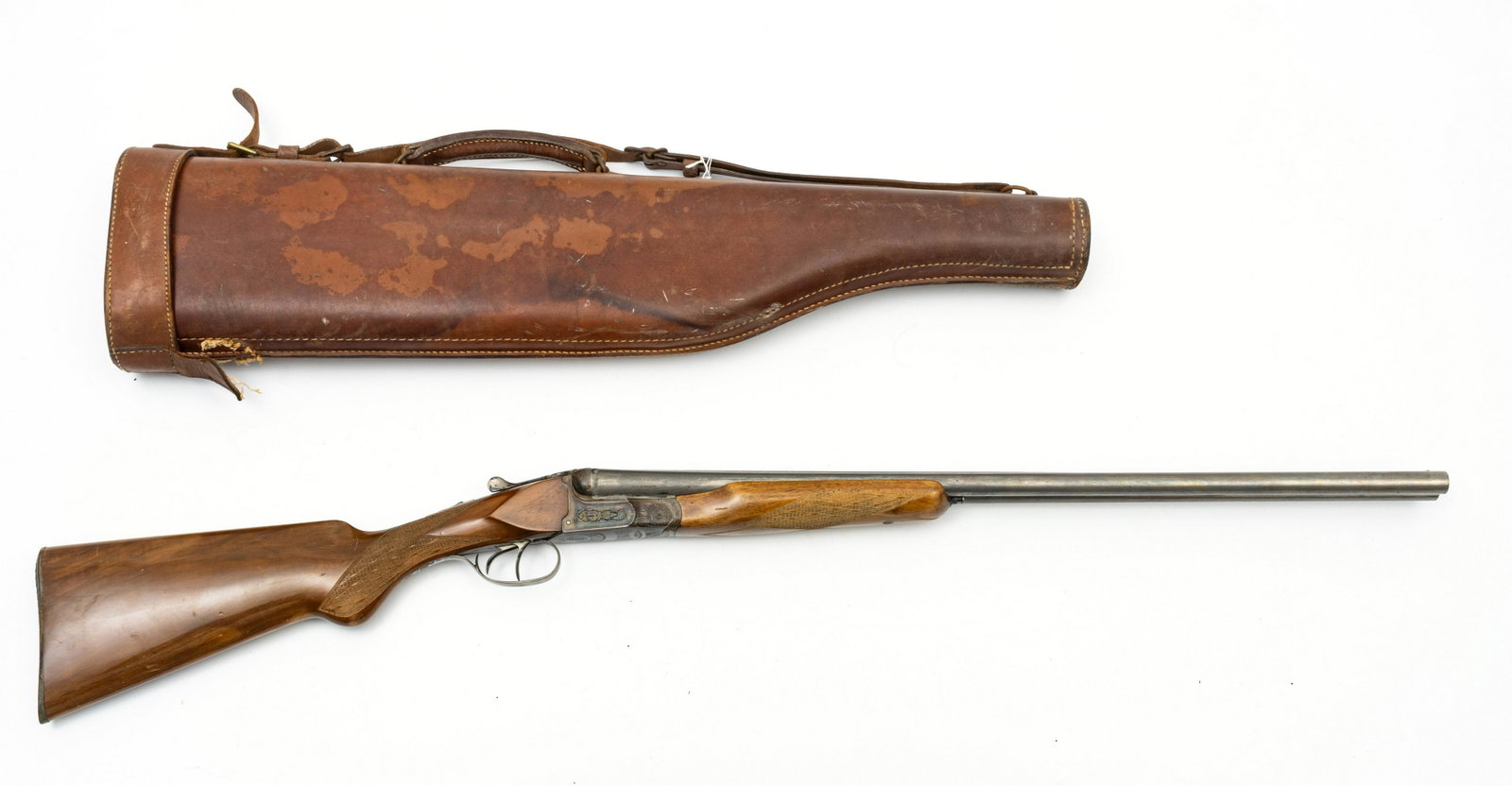 ANTONIO ZOLI, ATLAS MODEL 208 SIDE BY SIDE SHOTGUN, 20: ANTONIO ZOLI, ATLAS MODEL 208 SIDE BY SIDE SHOTGUN, 20 GA., 20TH C., L 26" BARREL, SN AR31991 Side by side 20 gauge shotgun having a wooden stock and foregrip, tang safety, and bead front sight. Recei