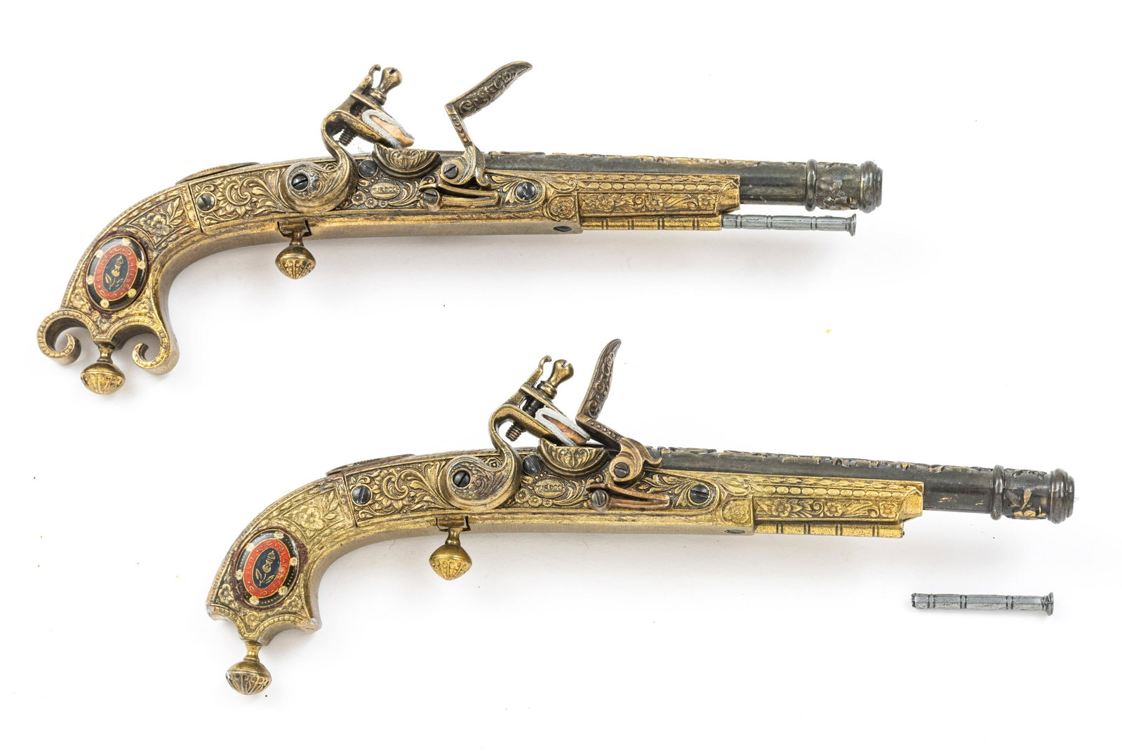 LACESSIT SCOTTISH MURDOCH REPLICA FLINTLOCK PISTOLS,: LACESSIT SCOTTISH MURDOCH REPLICA FLINTLOCK PISTOLS, 20TH C., PAIR, L 12" A pair of non-firing replica Scottish Murdoch pistols. Brass body with LaCessit emblem on the grip. Provenance: Estate of Joan