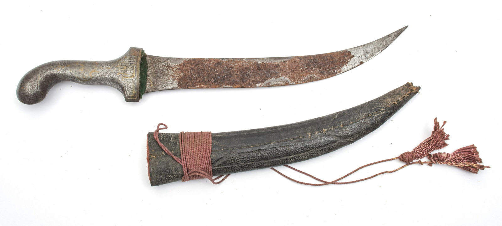 MIDDLE EASTERN JAMBIYA DAGGER, 19TH C., L 12" BLADE: MIDDLE EASTERN JAMBIYA DAGGER, 19TH C., L 12" BLADE Floral engraving at the ricasso with gilt highlights. Metal grip also having gilt decoration. Includes a leather and wood sheath.