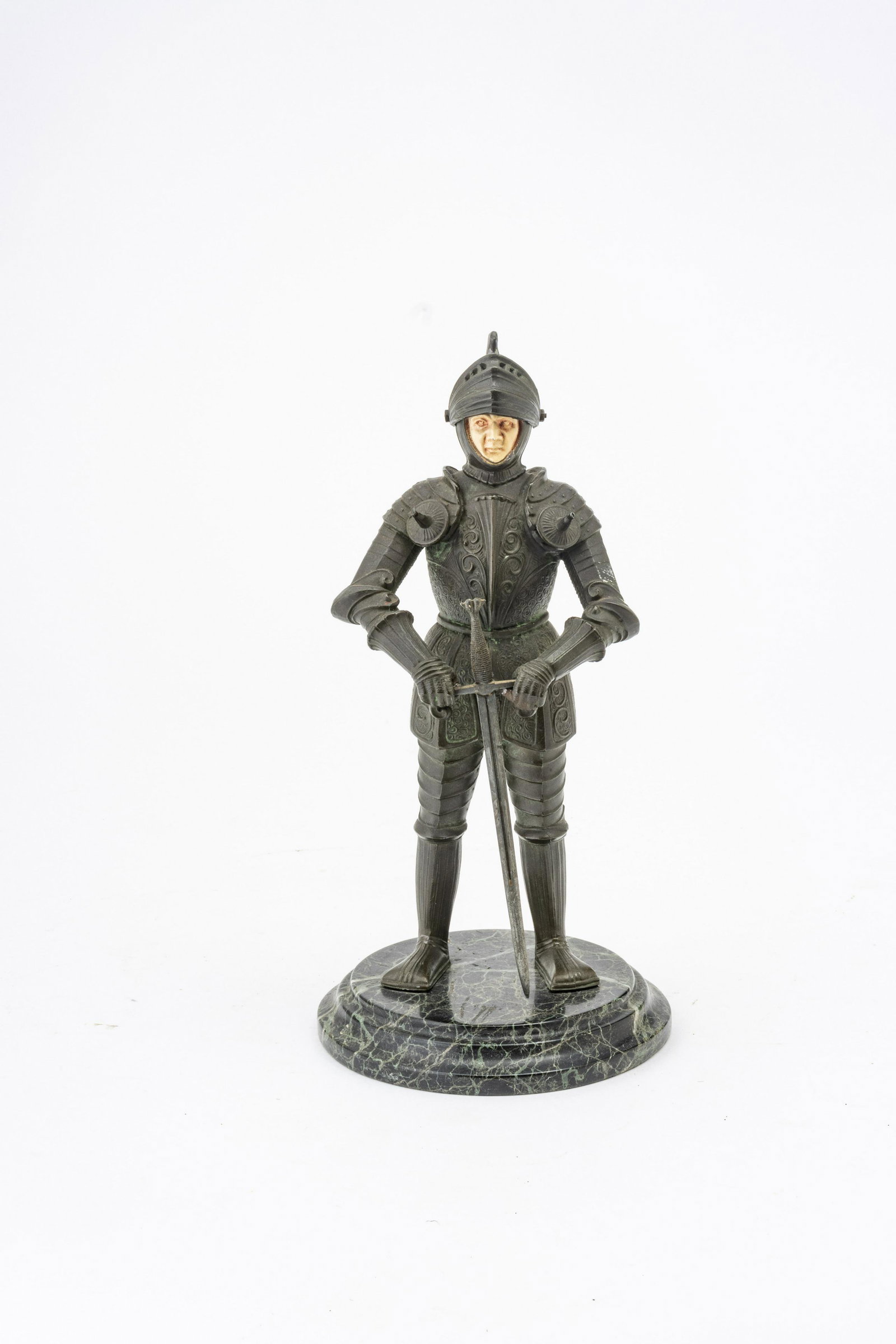BRONZE AND ENAMEL KNIGHT IN ARMOR, 20TH CENTURY H 9": BRONZE AND ENAMEL KNIGHT IN ARMOR, 20TH CENTURY H 9" WITH BASE D 4.5" UNSIGNED Provenance: Estate of Joan Young, Kalamazoo, Mi.