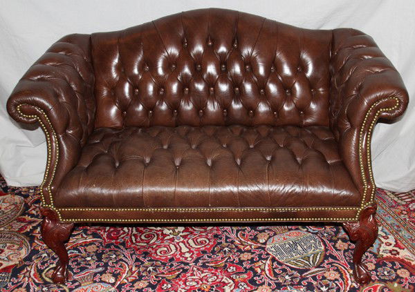 LEATHER CAMEL BACK SETTEES, PAIR, H 36", W 58": LEATHER CAMEL BACK SETTEES, PAIR, H 36", W 58", D 32:pair of tufted leather camel back settees with claw and ball feet and brass upholstery nail trim;