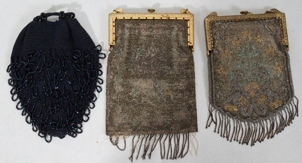 VINTAGE BEADED PURSES, THREE: VINTAGE BEADED PURSES, THREE:Two beige in color and one blue. Two having gilt metal frames; one with draw string closure;