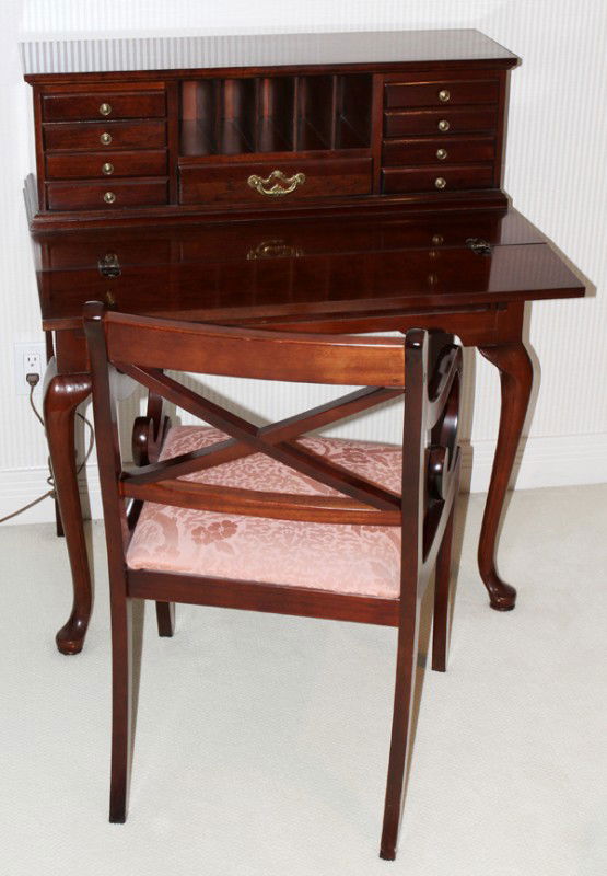 THOMASVILLE MAHOGANY DESK & CHAIR, H 39", W 34": THOMASVILLE QUEEN ANNE STYLE MAHOGANY DESK & CHAIR, H 39", W 34", D 18":Drop down writing surface, 9 small drawers, long drawer in frieze, 5 envelope slots; measures H.39 1/2" x 34" x 18". Along with