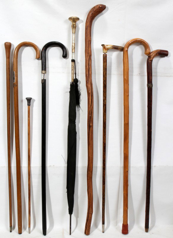 VICTORIAN/EDWARDIAN PARASOL, WALKING STICKS : VICTORIAN/EDWARDIAN PARASOL, WALKING STICKS & CANES, LATE 19TH-EARLY 20TH C., NINE:Including 1 rolled gold and mother-of-pearl handled parasol, L.40 1/2", 1 silver-capped walking stick featuring a bea