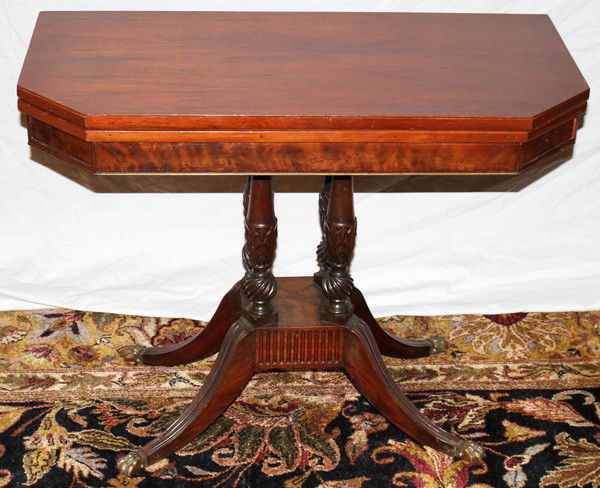 DUNCAN PHYFE STYLE MAHOGANY CONSOLE/CARD TABLE: DUNCAN PHYFE STYLE MAHOGANY CONSOLE/CARD TABLE, H 28", W 37", D 18":Hinged top opens to card table size. Circa 1940. Four central columns resting on four cyma curved legs. From the Collection of Willi