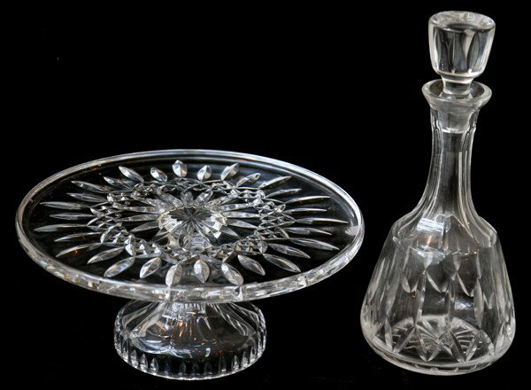 WATERFORD CRYSTAL CAKE STAND & DECANTER, : WATERFORD CRYSTAL CAKE STAND & DECANTER, H 5" & 11 1/2":Including 1 cake stand, H.5", Dia.11", and 1 decanter, H.11 1/2"; signed. From the collection of Joseph and Norina Simon, Grosse Pointe Farms, M