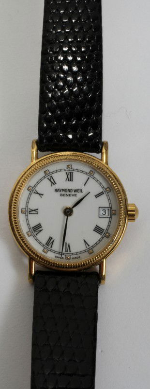 LADY'S RAYMOND WEIL, 18KT GOLD PLATED WATCH: LADY'S RAYMOND WEIL, 18KT GOLD PLATED WATCH:Lady's Raymond Weil 18kt gold plated wrist watch on a leather strap. From the collection of Joseph and Norina Simon, Grosse Pointe Farms, Mi.