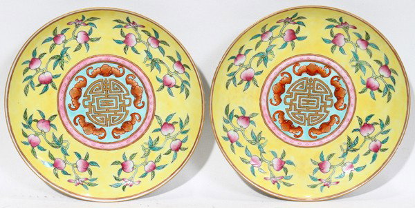 CHINESE FAMILLE ROSE PORCELAIN DISHES, PAIR: CHINESE FAMILLE ROSE PORCELAIN DISHES, PAIR:Yellow ground with peaches, bats and long life characters. Stamped on underside.