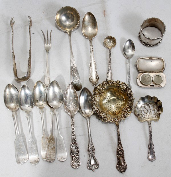 STERLING & SILVERPLATE GROUPING, 25 PIECES: STERLING & SILVERPLATE GROUPING, 25 PIECES:Includes 6 teaspoons monogrammed 'ATN'; 2 grapefruit spoons; napkin ring; 2 tea strainers; tongs; ladle, lemon fork, teaspoon, demitasse spoon; coin holder a