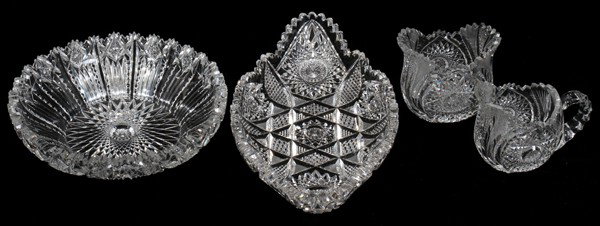 ANTIQUE CUT CRYSTAL ENSEMBLE, FOUR PIECES: ANTIQUE CUT CRYSTAL ENSEMBLE, FOUR PIECES:One brilliant period fruit bowl, H 2 1/2", Dia 9 3/4"; an ice cream dish H 2". L 14 1/4" with pineapple and hob star cut and a cream and open sugar with hob s