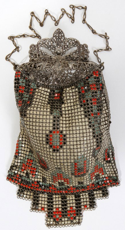 ART DECO MESH PURSE C. 1900 BY WHITING & DAVIS: ART DECO MESH PURSE, C. 1900, BY WHITING & DAVIS:Silver filigree frame. W 2 3/4". H 7". Red, black and blue motif. Cream ground. Tag reads Whiting and Davis.