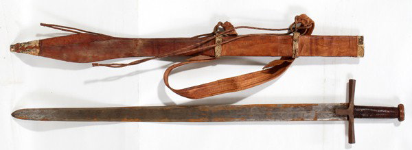SWORD IN A LEATHER SHEATH L 38" KHARTOUM SUDAN: SWORD IN A LEATHER SHEATH, L 38", KHARTOUM SUDAN:Cobra skin embellishments, the handle is wrapped in leather. From Khartoum. From the collection of Dr Douglas Crary, Ann Arbor, Mi.