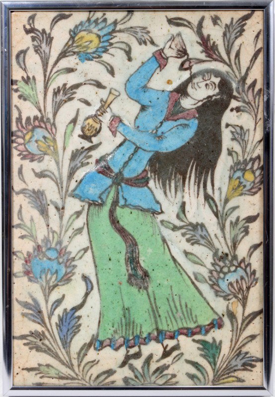 PERSIAN GLAZED POTTERY TILE, 11" X 7 3/4", : PERSIAN GLAZED POTTERY TILE, 11" X 7 3/4", FRAMED:Depicting a woman dressed in turquoise and green amongst stylized flowers, framed. From the collection of Dr Douglas Crary, Ann Arbor, Mi.