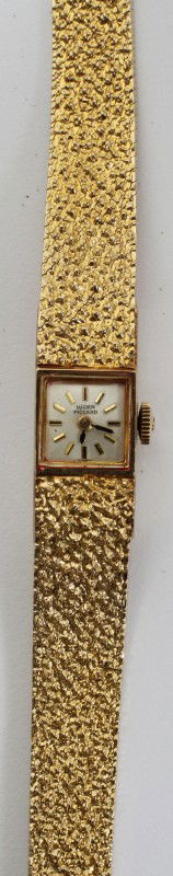 LUCIEN PICCARD LADY'S 14 KT GOLD WATCH, L 9": LUCIEN PICCARD LADY'S 14 KT GOLD WATCH, L 9":C 8627. In original box.