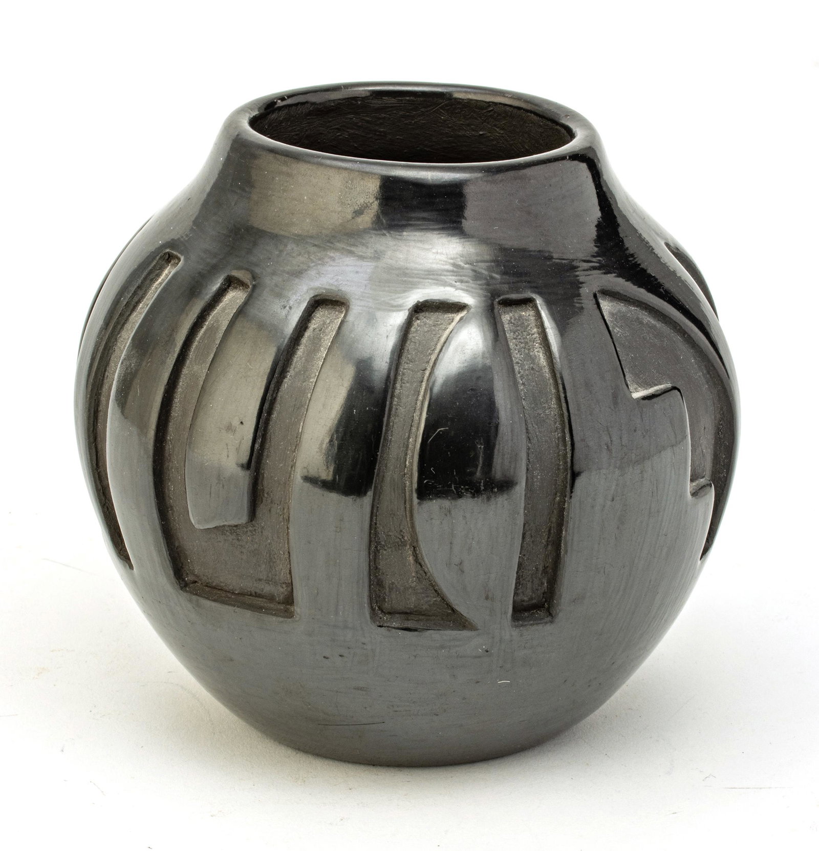 FRANCES SALAZAR, PUEBLO, SANTA CLARA, EARTHENWARE VASE,: FRANCES SALAZAR, PUEBLO, SANTA CLARA, EARTHENWARE VASE, H 5.5", DIA 5.5" A Santa Clara earthenware carved blackware vase by Pueblo potter, Frances Salazar. Black on black. Offers recessed geometric fo