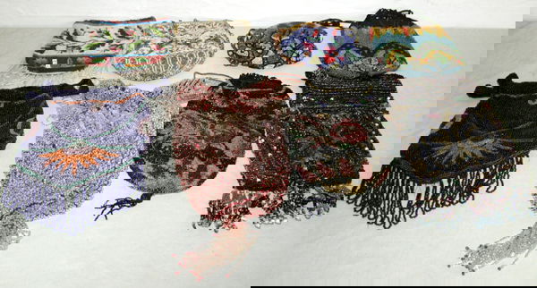 ANTIQUE BEADED HANDBAG GROUP: ANTIQUE BEADED HANDBAG GROUP, C.1920, 8 PCS., H 4" - 10":having beaded floral designs, brass, metal and shell frames all in various colors.