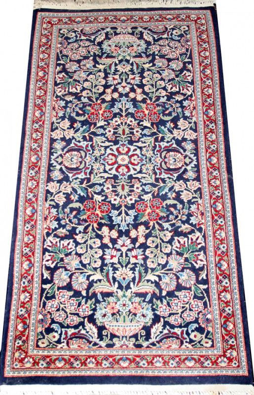 SAROUK ORIENTAL RUG, 4' 0" X 2' 0": SAROUK ORIENTAL RUG, 4' 0" X 2' 0":Navy blue ground with overall floral pattern in shades of red, light blue and green, four borders;