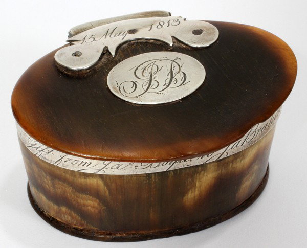 SILVER-MOUNTED HORN SNUFF BOX, DATED 1813,: SILVER-MOUNTED HORN SNUFF BOX, DATED 1813, H 1 1/4", L 2 1/2":Oval horn box with hinged lid and silver mounts, engraved "15 May 1813" at the hinge on the cover above cipher enclosing "JB" monogram, th