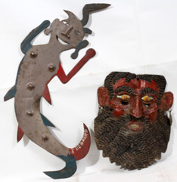 MEXICAN TIN DANCE MASK & HAITI METAL WALL ART: MEXICAN TIN DANCE MASK, H 12", & HAITI METAL WALL ART, L 24", SIGNED:Including 1 Mexican dance mask in the manner of a bearded man, punched tin painted in shades of red and black, H.12 1/2" x 10"; tog