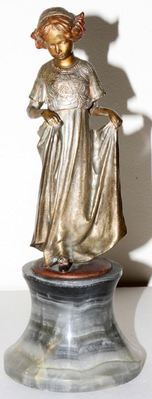 AUSTRIAN BRONZE SCULPTURE, H 10", A LITTLE GIRL: AUSTRIAN BRONZE SCULPTURE, H 10", A LITTLE GIRL:Stamped "Made in Austria" at the base. From the collection of Joseph and Norina Simon, Grosse Pointe Farms, Mi.