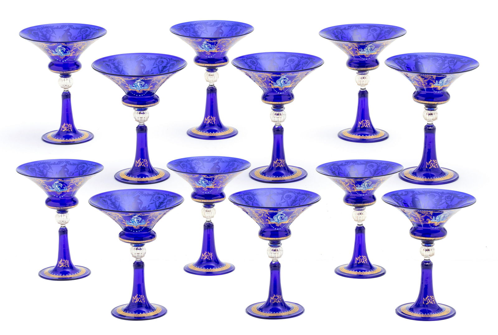 VENETIAN HAND BLOWN CHAMPAGNES SET OF 12 H 6": VENETIAN HAND BLOWN CHAMPAGNES SET OF 12 H 6" Enamel decorated. Width 4 3/4". Gold blown into orb on stem. Provenance: Property of a Bloomfield Hills, MI private collection.