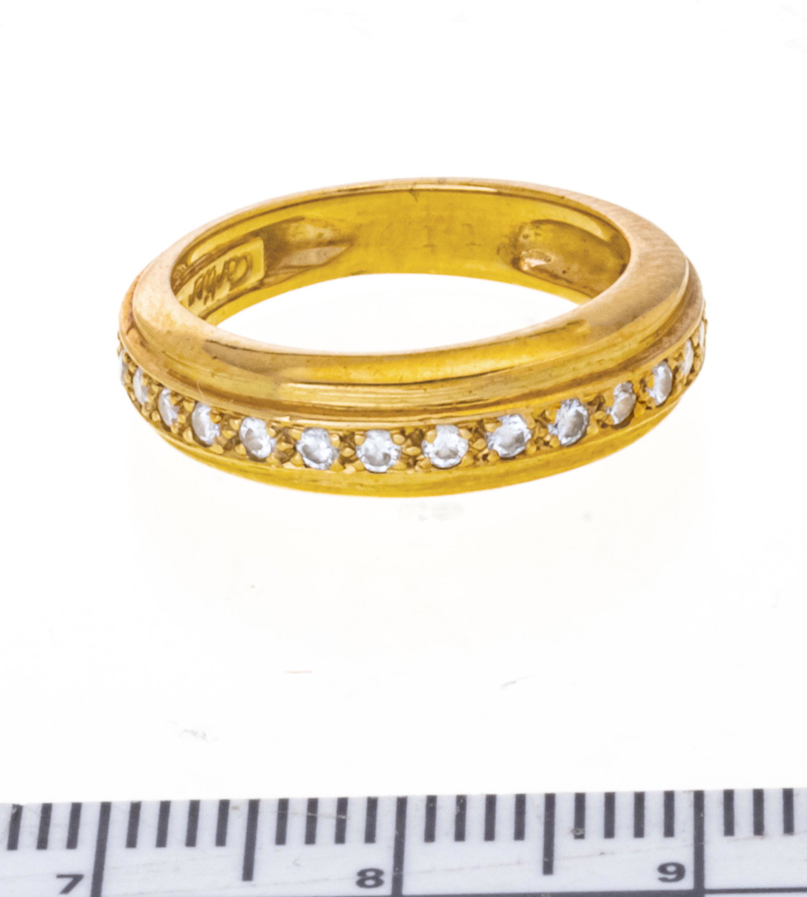 CARTIER 18KT YELLOW GOLD AND DIAMOND BAND SIZE 5 3/4: CARTIER 18KT YELLOW GOLD AND DIAMOND BAND SIZE 5 3/4 Diamond studded. 6 gr. No inscriptions.