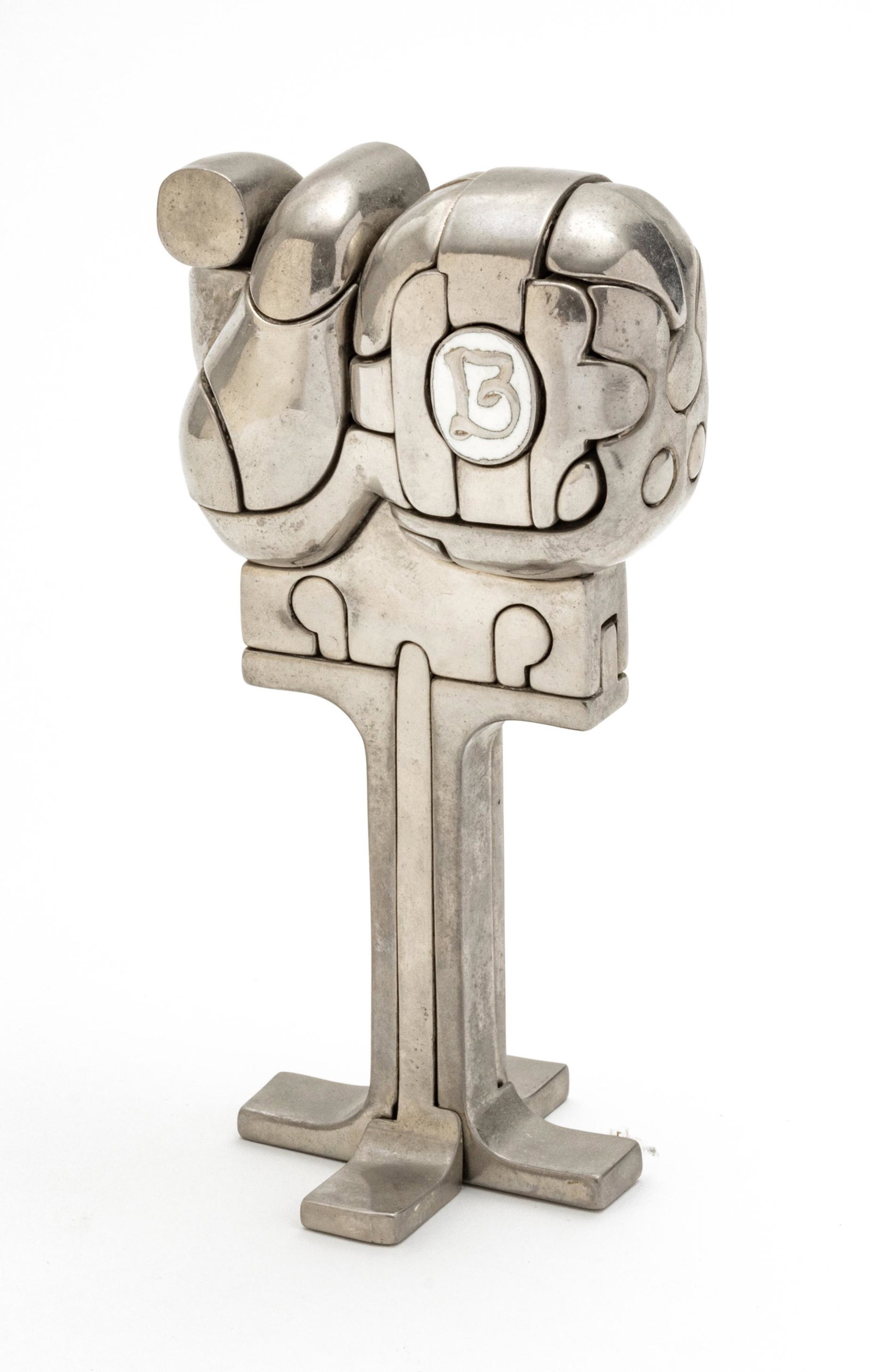MIGUEL ORTIZ BERROCAL (SPAIN 1933-2006) SILVERED BRASS PUZZLE SCULPTURE, H 6", "CRISTINA": MIGUEL ORTIZ BERROCAL (SPAIN 1933-2006) SILVERED BRASS PUZZLE SCULPTURE, H 6", "CRISTINA" A silvered brass puzzle sculpture titled "Cristina" by Miguel Ortiz Berrocal. Artist's signature and edition n