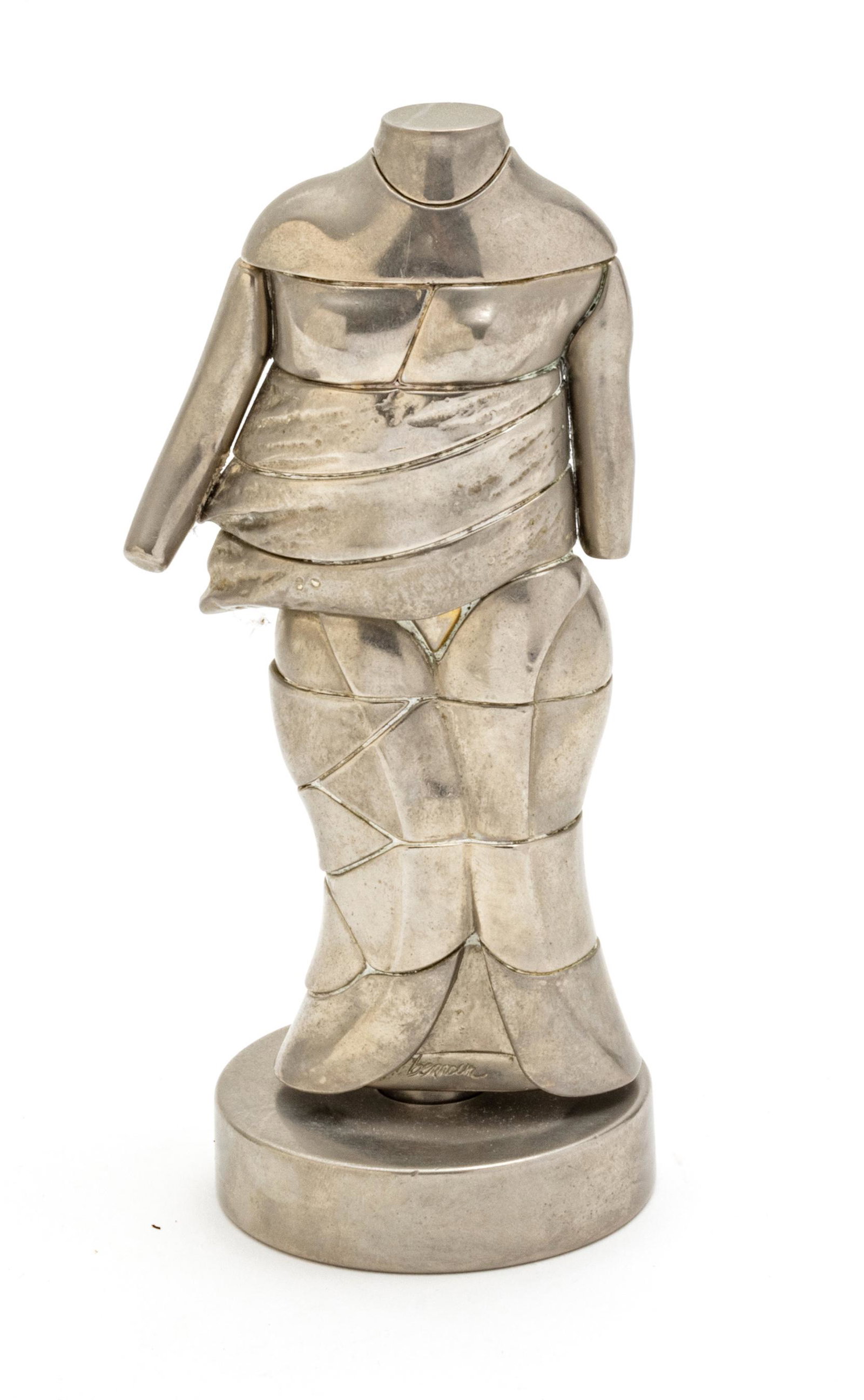MIGUEL ORTIZ BERROCAL (SPAIN 1933-2006) SILVERED BRASS PUZZLE SCULPTURE, H 6", "MINI CARIATIDE": MIGUEL ORTIZ BERROCAL (SPAIN 1933-2006) SILVERED BRASS PUZZLE SCULPTURE, H 6", "MINI CARIATIDE" A silvered brass puzzle sculpture titled "Mini Cariatide" by Miguel Ortiz Berrocal. Width 2.25", depth 2