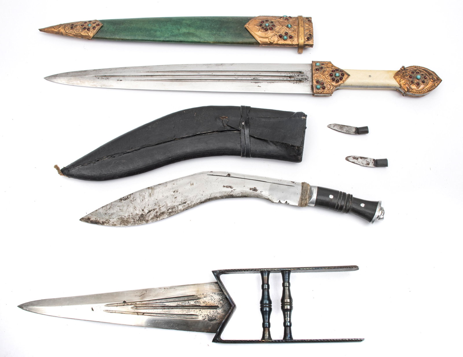 INDIAN KATAR, KUKRI AND SHORT SWORD, 20TH C., THREE PIECES, L 16" TO 22": INDIAN KATAR, KUKRI AND SHORT SWORD, 20TH C., THREE PIECES, L 16" TO 22" Lot includes one modern Katar push dagger, L 16". One Kukri knife, marked India on the ricasso, includes a leather and wood she