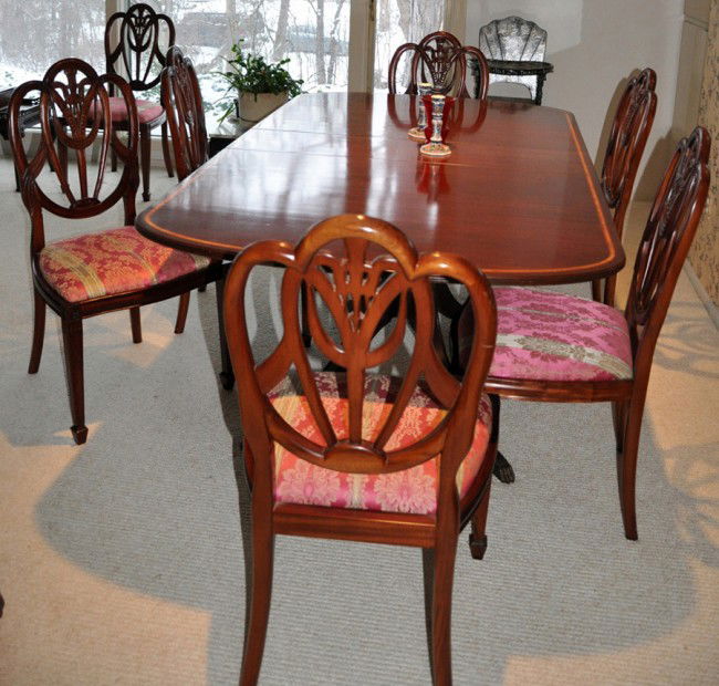 INLAID MAHOGANY DINING ROOM TABLE & 8 CHAIRS: INLAID MAHOGANY DINING ROOM TABLE & EIGHT CHAIRS, H 30", L 67", D 44":Dining room set includes table plus three 11" leaves, one arm chair and seven side chairs H 39 1/2" each upholstered in deep rose