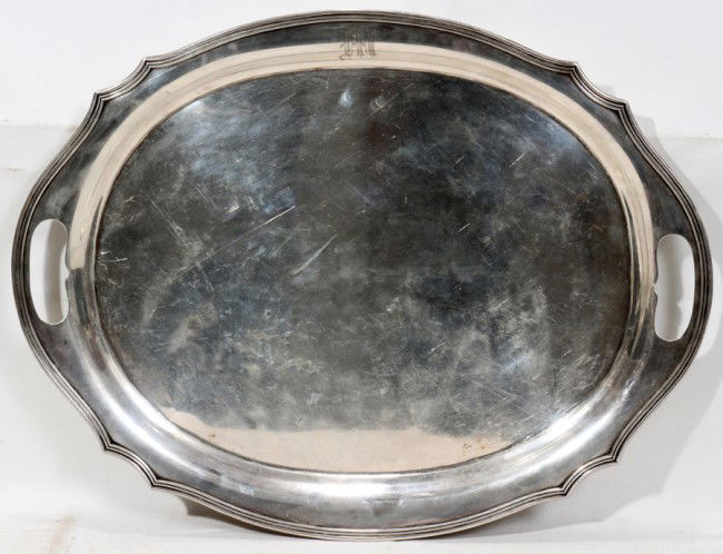 RICHARD M. WOODS & CO., NYC, STERLING OVAL TRAY: RICHARD M. WOODS & CO., NYC, STERLING SILVER OVAL TRAY, C. 1920 -1950, 21 1/2" X 16 1/2":50.79 troy ounces by electronic balance; reeded rim is partially scalloped; 'cut out' side handles; #1117; mono