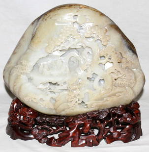 CHINESE CARVED JADE SCENE, H 10", L 12": CHINESE CARVED JADE SCENE, H 10", L 12":Finely carved into the stone and featuring a mountain scene with elders, trees, flowers and deer. The reverse is carved with pine trees and people. Atop a carve