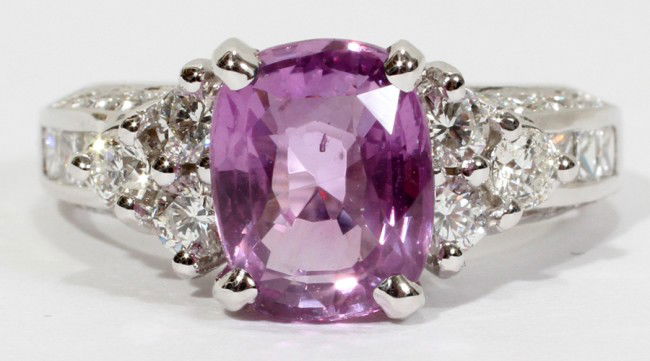 3.52 CT. PINK SAPPHIRE & 1.20 CT. DIAMOND RING: 3.52 CT. PINK SAPPHIRE & 1.20 CT. DIAMOND RING:Size 6 1/2. Diamonds G-H color, Vs-2 clarity. 14kt white gold. Total weight 5.9 grams.