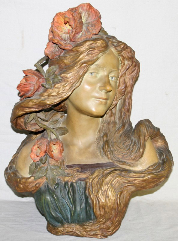 ART NOUVEAU BUST OF A YOUNG GIRL, H 22", W 18": ART NOUVEAU BUST OF A YOUNG GIRL, H 22", W 18":Polychromed plaster or pottery; signed.