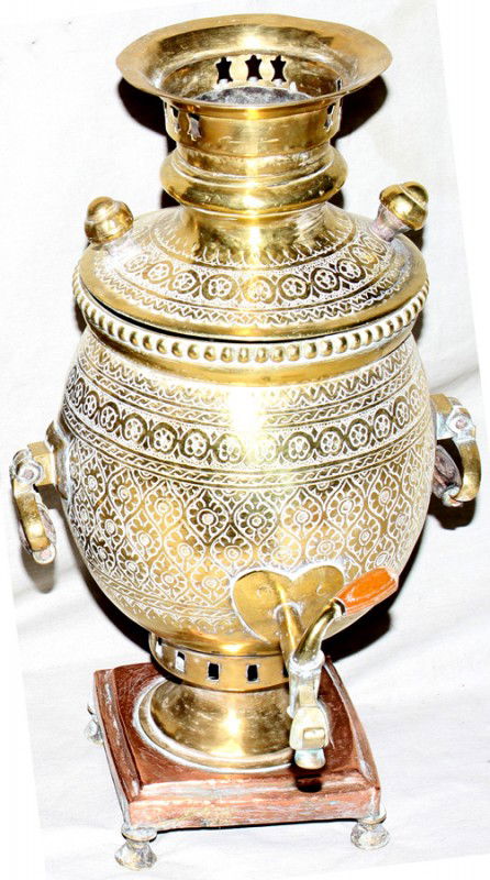 MIDDLE EASTERN BRASS SAMOVAR, ANTIQUE, H 16",: MIDDLE EASTERN BRASS SAMOVAR, ANTIQUE, H 16", W 9":Having a hand hammered floral and geometric motif. No apparent markings or signature. RG