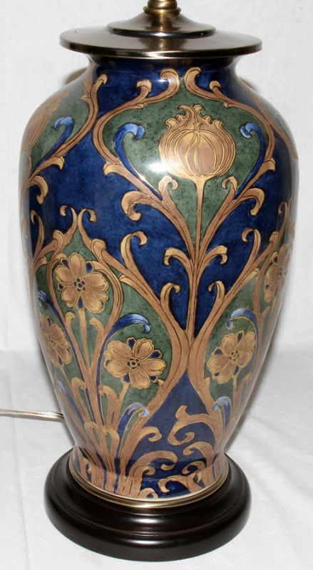 CERAMIC TABLE LAMP, H 14 1/2", 26" OVERALL: CERAMIC TABLE LAMP, H 14 1/2", 26" OVERALL:Art nouveau style, floral motif on a cobalt blue ground. From the Estate of Pearl McKenney, Grosse Pointe Farms.