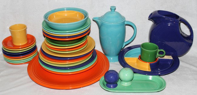 FIESTA WARE PLATES, MUGS & SERVING PIECES, 34 : FIESTA WARE PLATES, MUGS & SERVING PIECES, 34 PIECES:A colorful assortment including 2 dinner plates, Dia.10 1/4", 5 luncheon plates, Dia.9 1/2", 4 salad plates, Dia.7 1/4", 4 bread-and-butter plates,