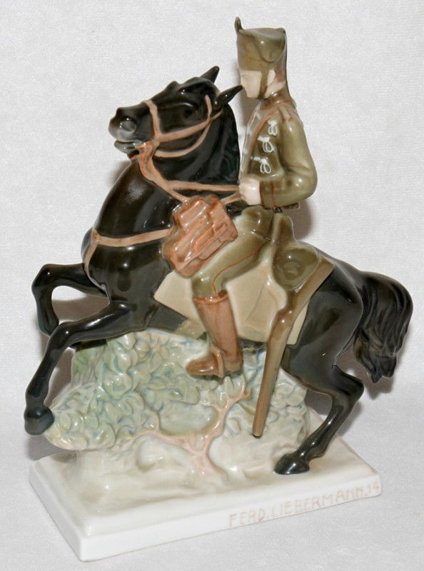 FERDINAND LIEBERMAN/ROSENTHAL PORCELAIN FIGURE: FERDINAND LIEBERMAN/ROSENTHAL PORCELAIN FIGURE, SOLDIER ON HORSEBACK, H 7 1/2":Impressed "Ferd. Liebermann" at the side of the base. Ferdinand Liebermann, German, 1883-1941. From the Estate of Pearl M