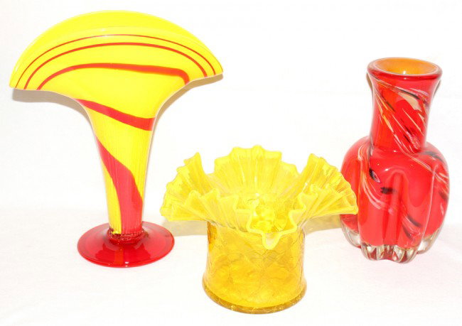 ART GLASS VASES, THREE, H 6"-11 3/4": ART GLASS VASES, THREE, H 6"-11 3/4":One crackle glass with ruffled collar, one in fan shape, hand blown, yellow and red, one red hand blown glass with black and white streaks.