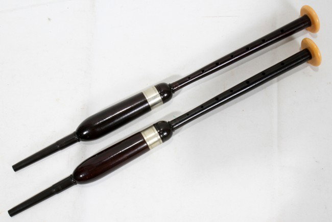 MACPHERSON EDINBURGH CHANTERS WITH IVORY TIPS &: MACPHERSON EDINBURGH CHANTERS WITH IVORY TIPS & WOOD SHAFTS, TWO, L 18":Appear to have never been used. From the collection of Dr. Douglas Crary, Ann Arbor, Mich.