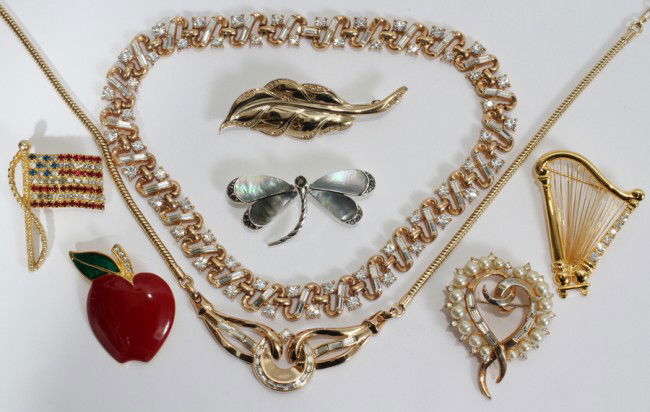 TRIFARI & MONET NECKLACES & BROOCHES, EIGHT: TRIFARI & MONET NECKLACES & BROOCHES, EIGHT PIECES:Includes one gold filled neck chain and white stone pendant, L 16"; one Trifari necklace, L 14"; one Trifari heart brooch; and four Monet brooches (h